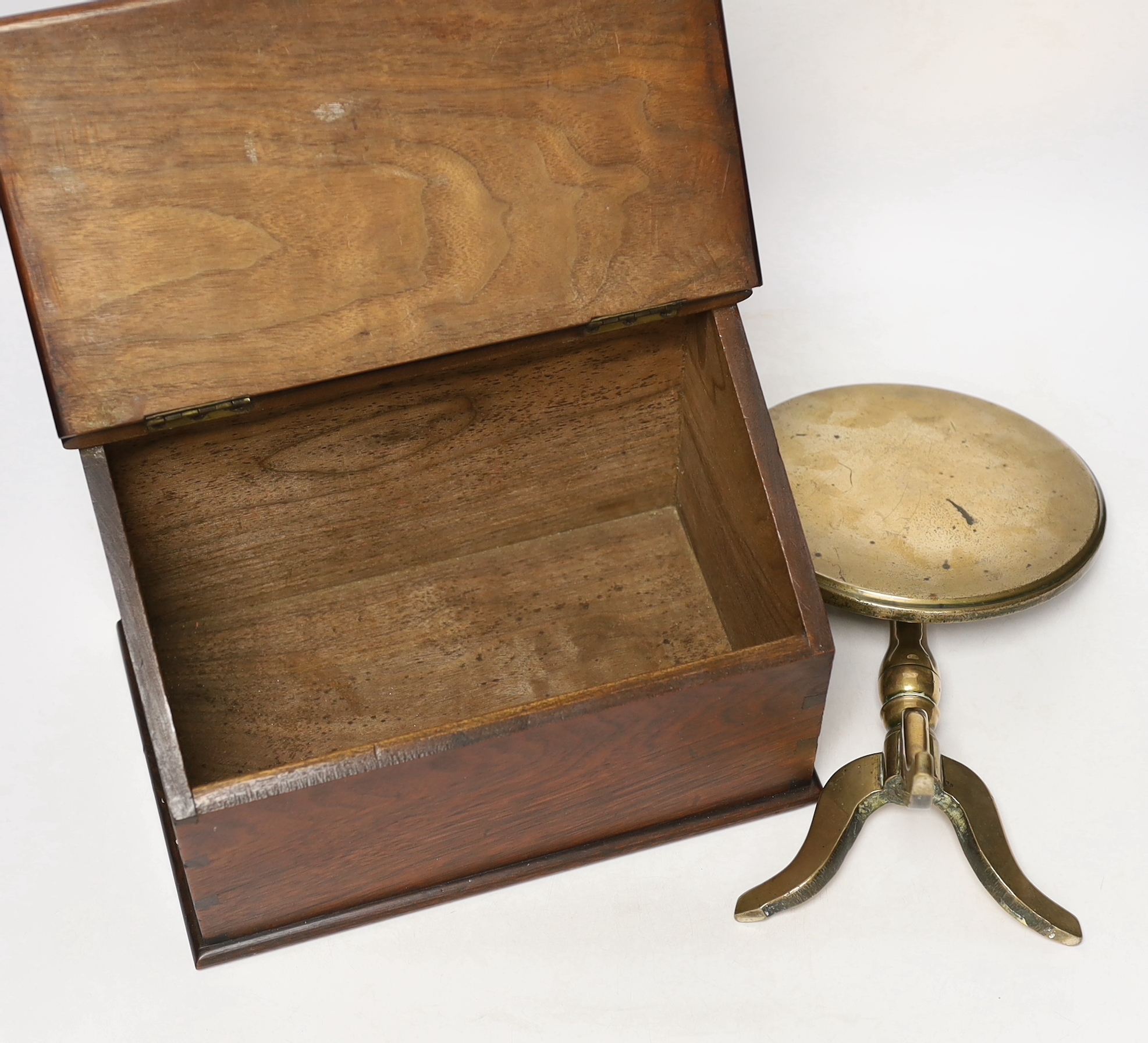 A Georgian brass trivet and a 19th century candle box, largest 27cm wide